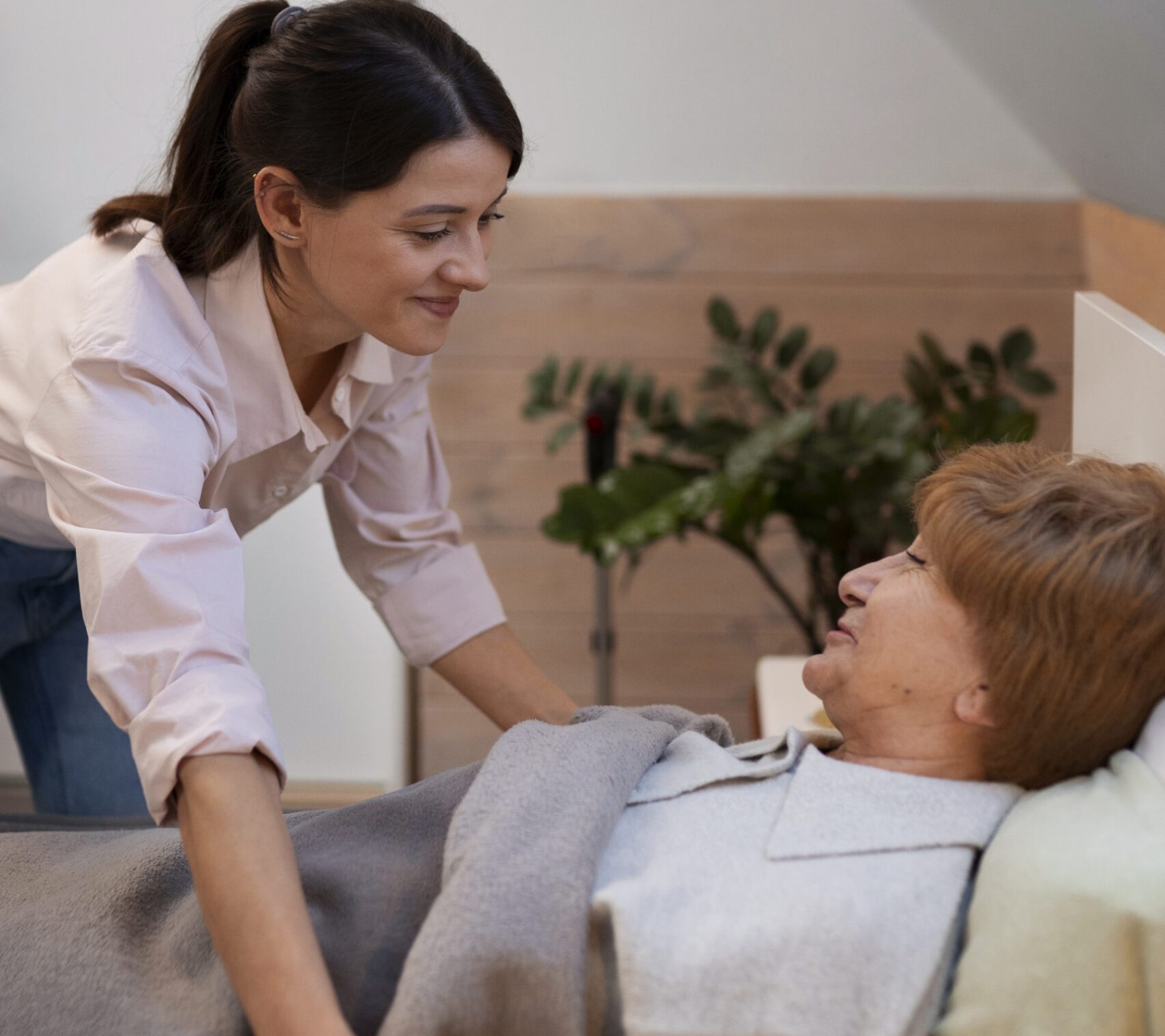 female-nurse-taking-care-elderly-person (1)